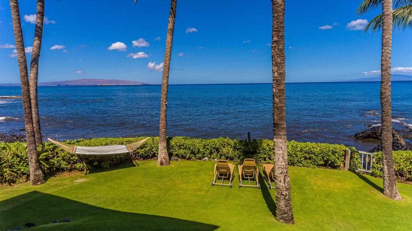 OCEANFRONT MAUI BLISS is where proximity meets privacy. The art - Beach Home for sale in Kihei, Hawaii on Beachhouse.com