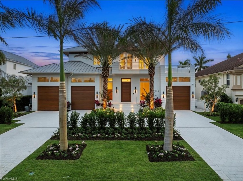 Introducing an exceptional waterfront estate in Aqualane Shores - Beach Home for sale in Naples, Florida on Beachhouse.com