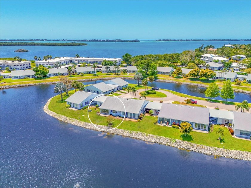 PICTURESQUE LAKE VIEWS AND AN EXCEPTIONAL VALUE IN COASTAL - Beach Condo for sale in Bradenton, Florida on Beachhouse.com