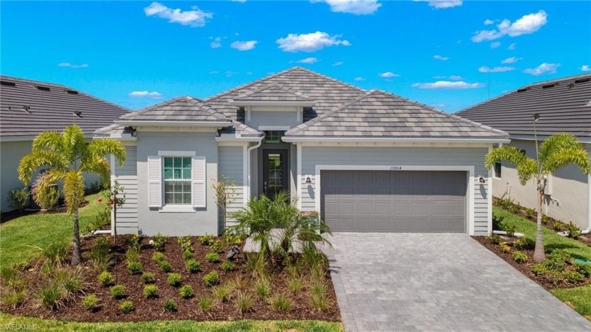 This beautiful, spacious Calusa floor plan home has extensive - Beach Home for sale in Punta Gorda, Florida on Beachhouse.com