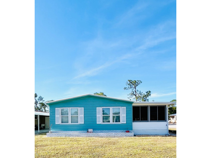 This beautifully maintained two-bedroom, two-bathroom home is - Beach Home for sale in North Fort Myers, Florida on Beachhouse.com