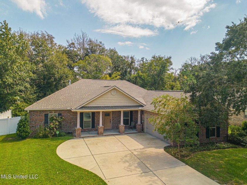 This charming 3 bedroom, 2 bath home is located in the serene - Beach Home for sale in Long Beach, Mississippi on Beachhouse.com