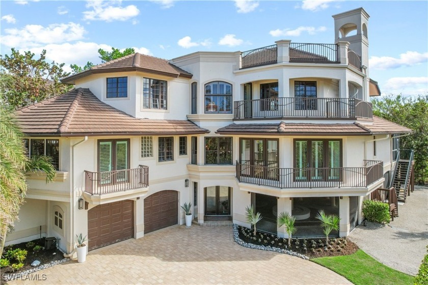 Stunning custom-built residence with modern elegance just steps - Beach Home for sale in Marco Island, Florida on Beachhouse.com