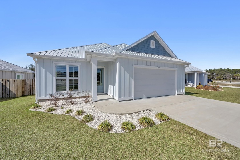 Welcome to easy coastal living in this custom built, GOLD - Beach Home for sale in Gulf Shores, Alabama on Beachhouse.com