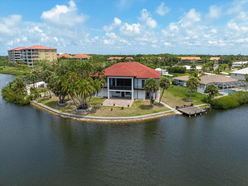 **EXCEPTIONAL WATERFRONT RESIDENCE with 210 ft CANAL FRONTAGE** - Beach Home for sale in Osprey, Florida on Beachhouse.com