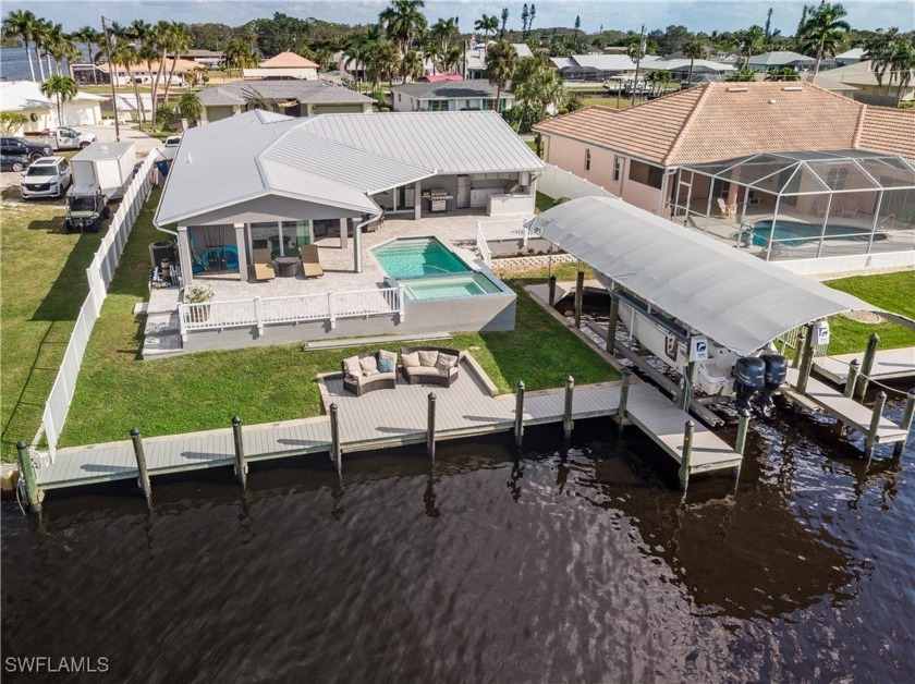 Welcome home to this fantastic deep water access play ground! - Beach Home for sale in Fort Myers, Florida on Beachhouse.com