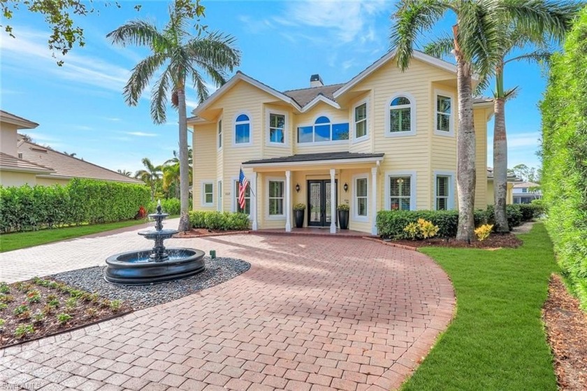 This exquisite two-story lakefront residence in the prestigious - Beach Home for sale in Naples, Florida on Beachhouse.com