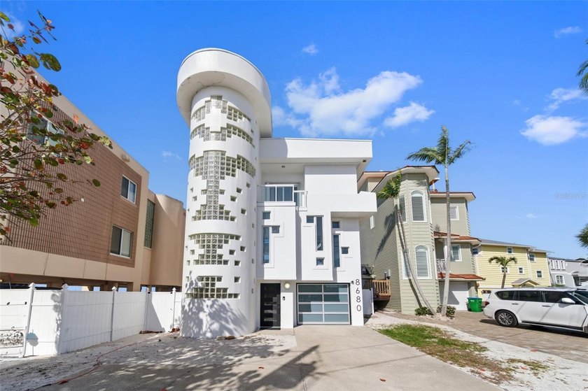 Sunset Beach's iconic *Glass Block Home,* masterfully envisioned - Beach Home for sale in Treasure Island, Florida on Beachhouse.com