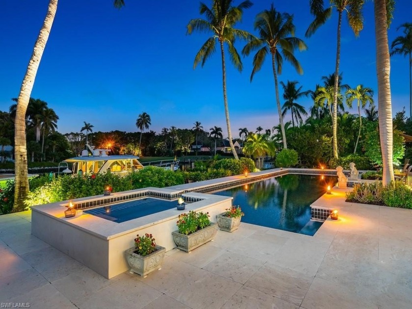 With lush landscaping and vistas of Runaway Bay, this Port Royal - Beach Home for sale in Naples, Florida on Beachhouse.com