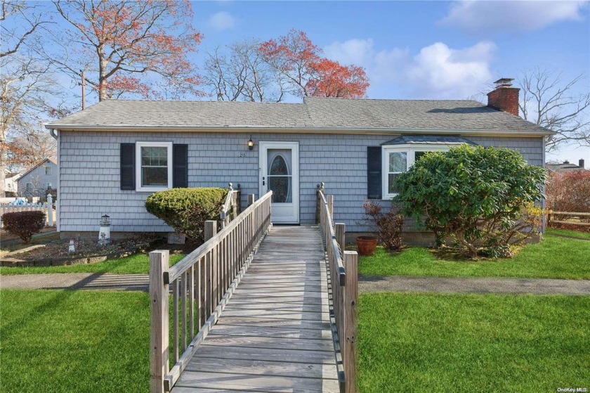 This Charming 3-bedroom, 1-bathroom ranch-style home, located on - Beach Home for sale in Mastic Beach, New York on Beachhouse.com