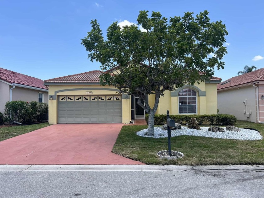 Discover this spacious 3-bedroom, 2-bath single-family home with - Beach Home for sale in Boynton Beach, Florida on Beachhouse.com