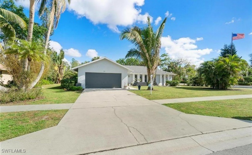 This home is conveniently located on a spacious corner lot of - Beach Home for sale in Naples, Florida on Beachhouse.com