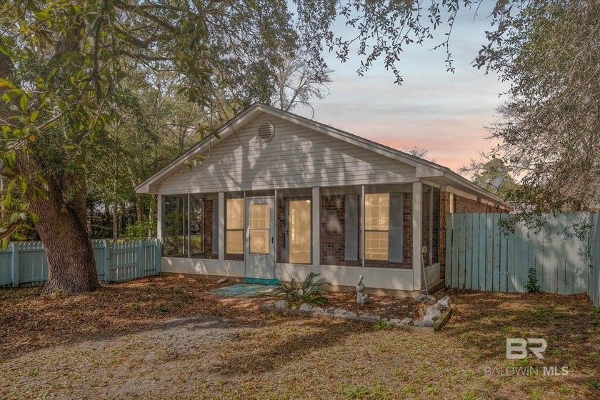 Welcome to this charming 4 bedroom/2 bathroom home nestled in - Beach Home for sale in Gulf Shores, Alabama on Beachhouse.com