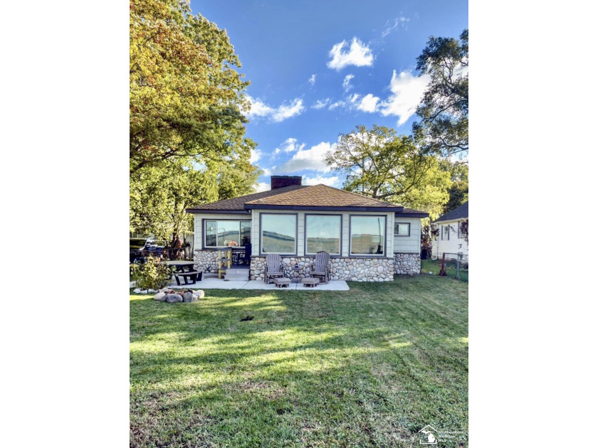 Enjoy modern comfort and lakeside serenity in this beautifully - Beach Home for sale in Newport, Michigan on Beachhouse.com