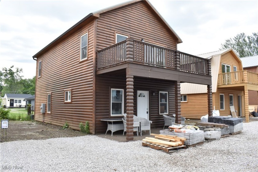 Cabins on the Lake New Construction log home on the shores of - Beach Condo for sale in Ashtabula, Ohio on Beachhouse.com