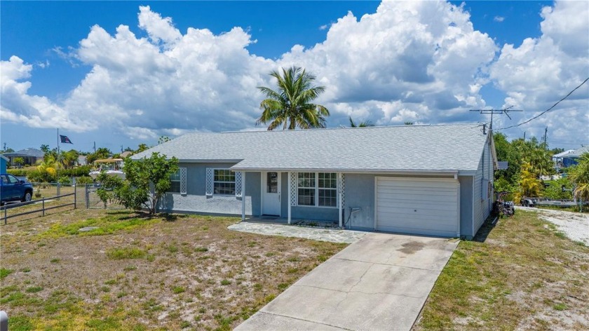 Welcome to your slice of waterfront paradise in Port Charlotte! - Beach Home for sale in Port Charlotte, Florida on Beachhouse.com