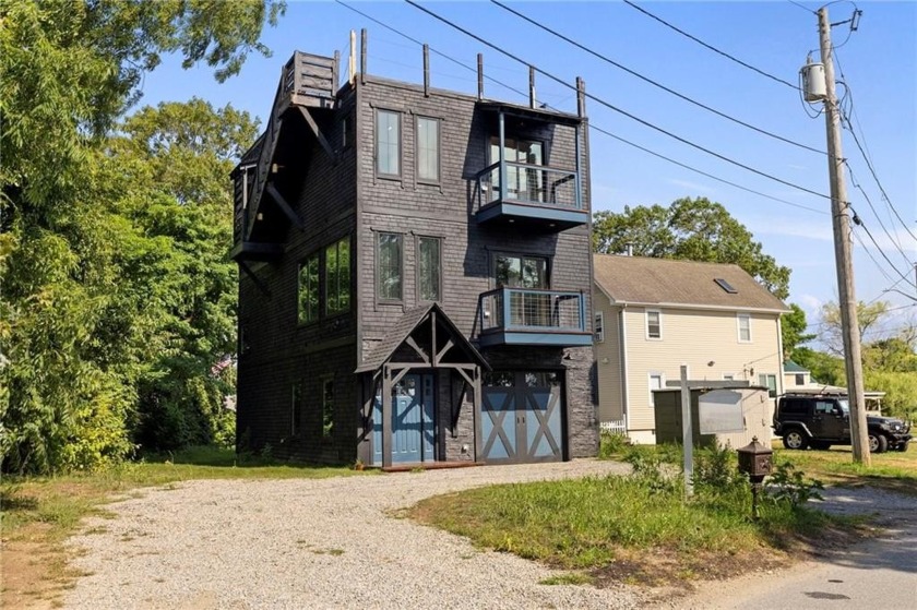 Nestled in a prime location, this newly constructed three-level - Beach Home for sale in Warwick, Rhode Island on Beachhouse.com