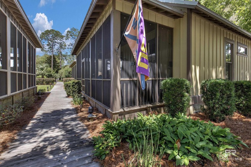 Don't miss your chance to own this delightful coastal cottage in - Beach Home for sale in Orange Beach, Alabama on Beachhouse.com