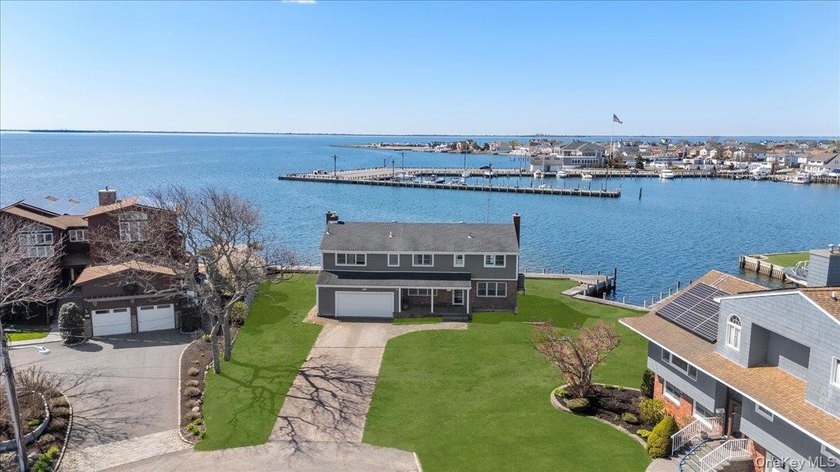 Wake up each morning to sweeping, unobstructed water views and - Beach Home for sale in West Islip, New York on Beachhouse.com