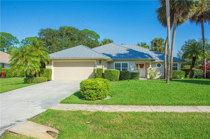 Tucked within the beautiful Woodlands subdivision, this home - Beach Home for sale in Vero Beach, Florida on Beachhouse.com