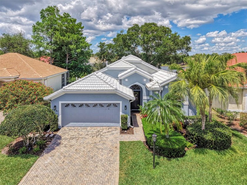 Stunning long-lake views set the stage for this beautifully - Beach Home for sale in Sarasota, Florida on Beachhouse.com