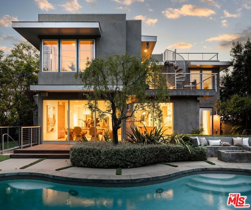 A striking contemporary in the coveted El Medio Bluffs, this - Beach Home for sale in Pacific Palisades, California on Beachhouse.com