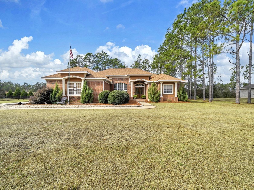 Beautiful all-brick home in a desirable golf course community - Beach Home for sale in Freeport, Florida on Beachhouse.com