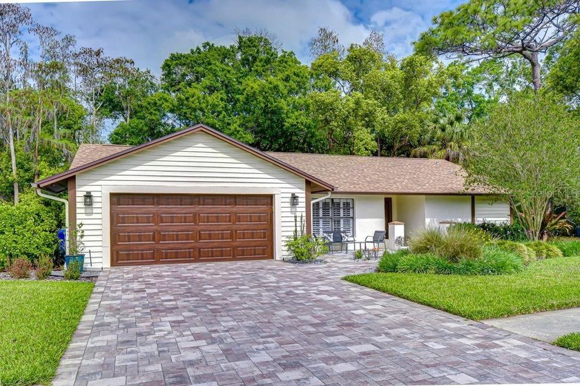 * GREAT NEW PRICE!!*  Nestled on a quiet street overlooking - Beach Home for sale in Tampa, Florida on Beachhouse.com