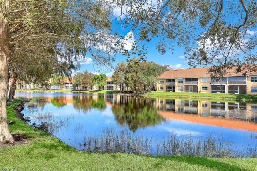 Sparkling long lake view and quality upgrades throughout in this - Beach Home for sale in Bonita Springs, Florida on Beachhouse.com