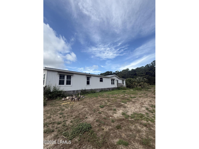 21+ ACRES! Welcome to your private Lowcountry retreat - a newer - Beach Home for sale in Saint Helena Island, South Carolina on Beachhouse.com
