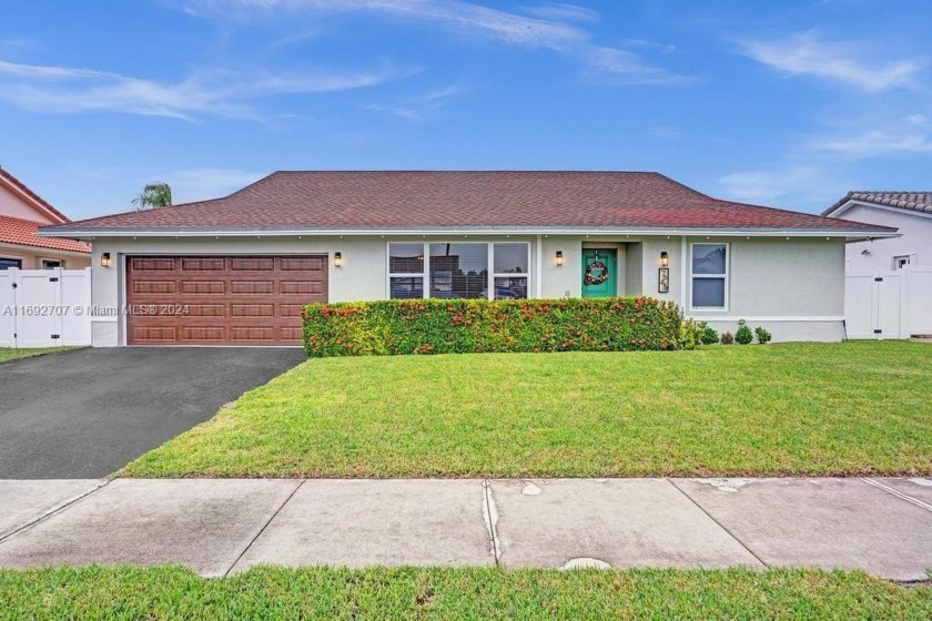 Welcome to Your Waterfront Oasis! Step through the inviting teal - Beach Home for sale in Margate, Florida on Beachhouse.com