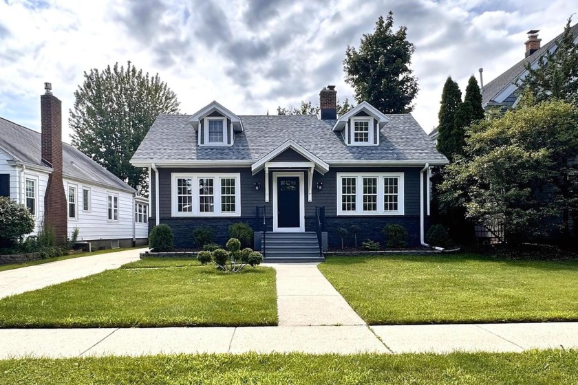 This ready to move in remodeled 1920's Cape Cod, ideally located - Beach Home for sale in Kenosha, Wisconsin on Beachhouse.com