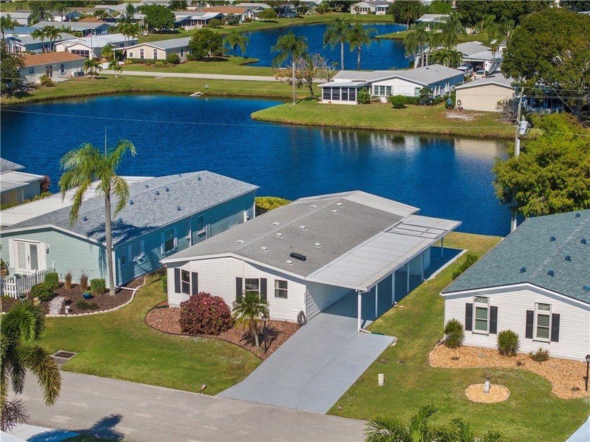 Enjoy stunning lake views in this precious 2/2 Savanna Club home - Beach Home for sale in Port Saint Lucie, Florida on Beachhouse.com
