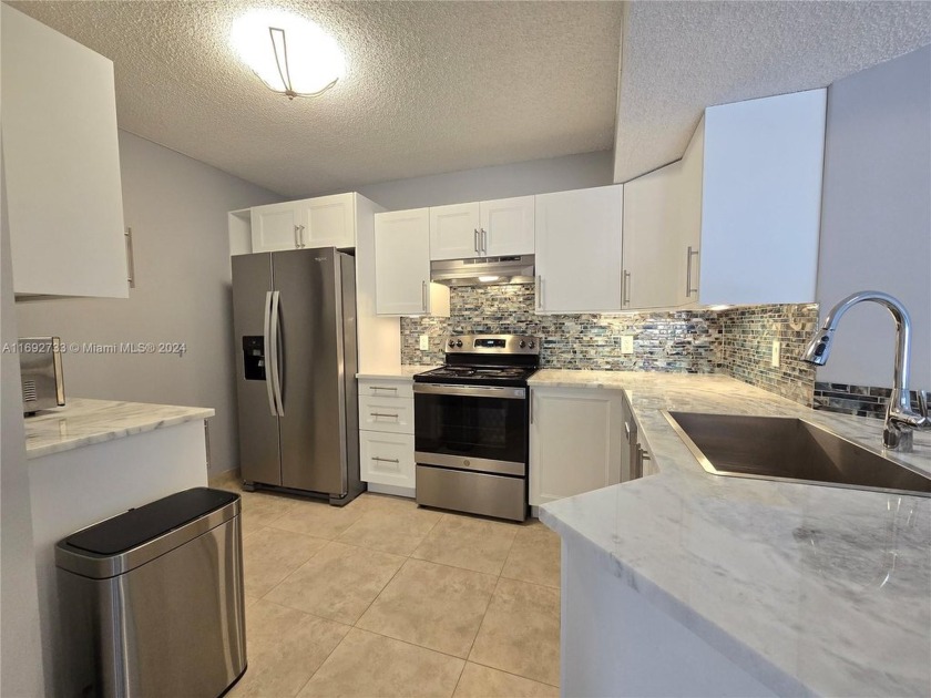 Beautiful 2 Bed, 2 Bath with lakeview, completely remodeled unit - Beach Condo for sale in Coral Springs, Florida on Beachhouse.com