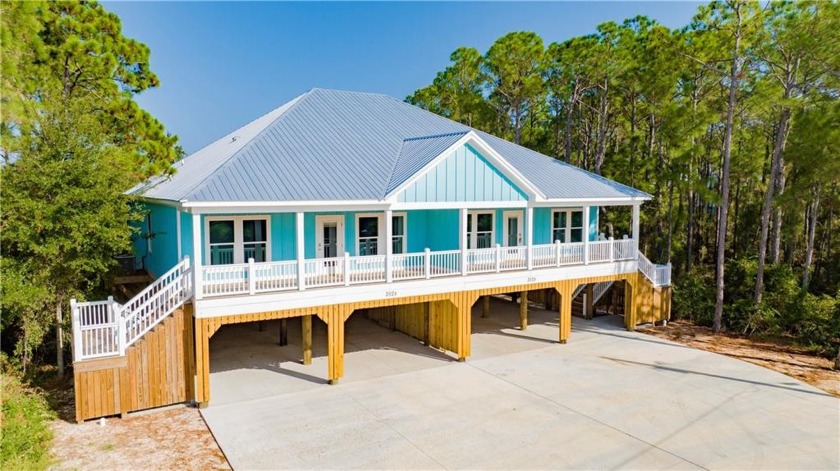 Beautiful new construction Fortified Gold Duplex built by custom - Beach Home for sale in Dauphin Island, Alabama on Beachhouse.com