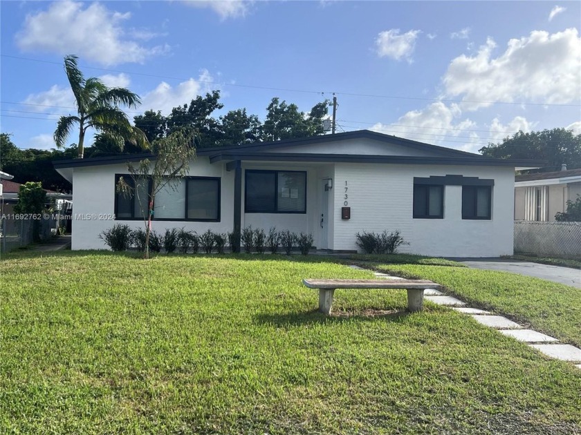 Beautiful 4-bedroom, 2-bathroom single-family home, thoughtfully - Beach Home for sale in North Miami Beach, Florida on Beachhouse.com