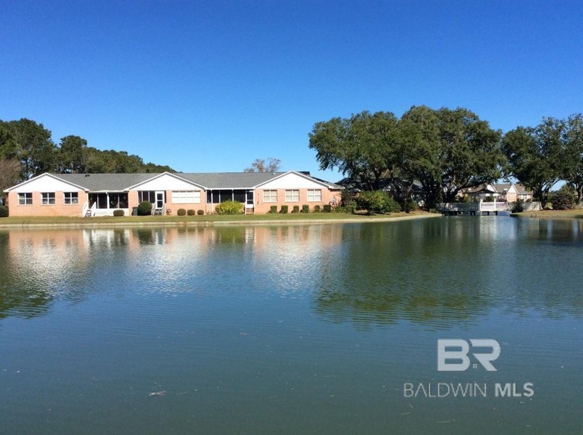 Tucked inside the natural beauty of Glenlakes Golf Club, this - Beach Home for sale in Foley, Alabama on Beachhouse.com