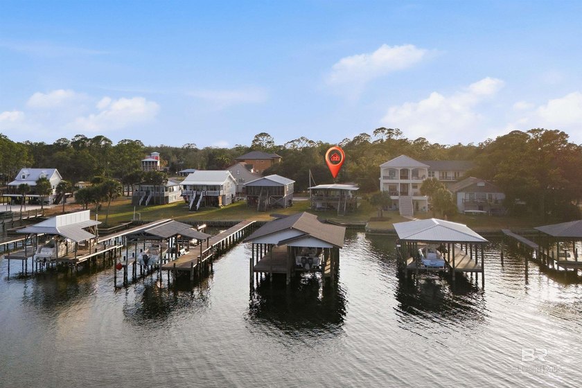 Experience the best of coastal living with this prime waterfront - Beach Home for sale in Orange Beach, Alabama on Beachhouse.com