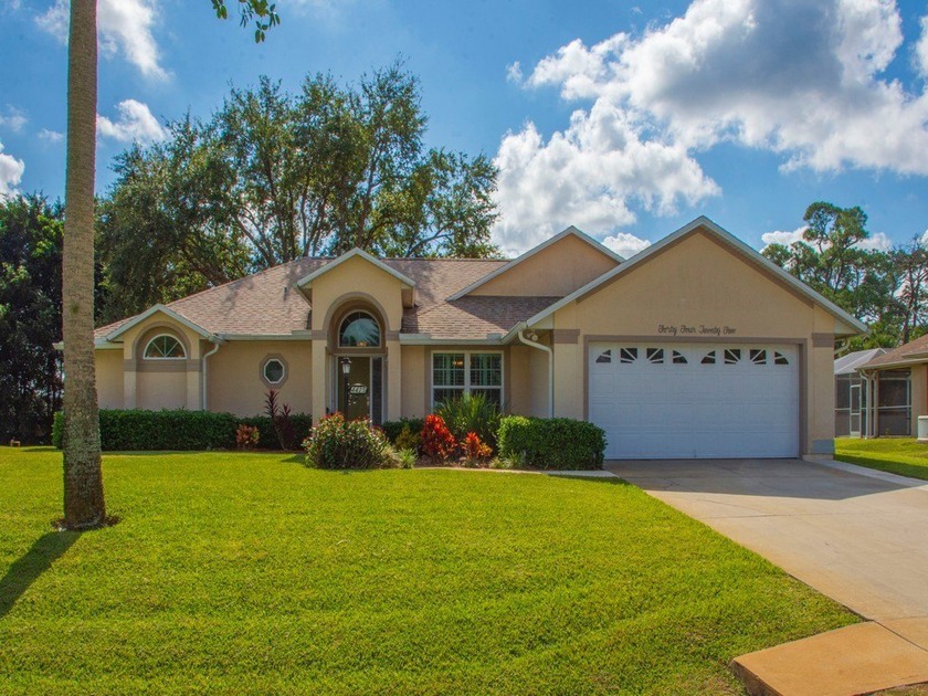 This impeccable 3 bed, 2 bath home on a lush .37-acre lot - Beach Home for sale in Vero Beach, Florida on Beachhouse.com
