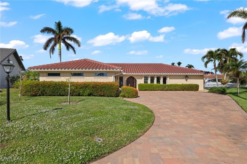 One of the best addresses in the deep-water boating community of - Beach Home for sale in Fort Myers, Florida on Beachhouse.com