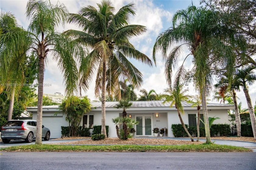 This Beautifully designed home has it all. Located in - Beach Home for sale in North Miami, Florida on Beachhouse.com