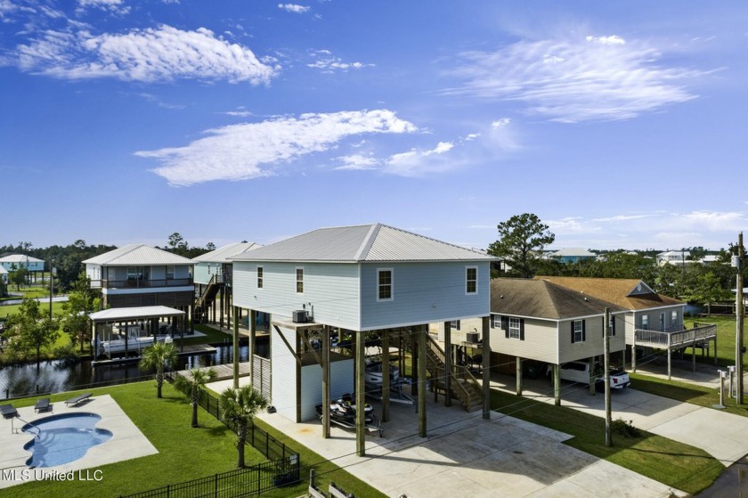 Beautiful waterfront home in Riverview section of Shoreline Park - Beach Home for sale in Bay Saint Louis, Mississippi on Beachhouse.com