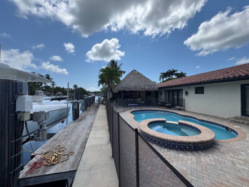 Stunning 4BR/3BA Med-style home in gated Keystone Point! Fully - Beach Home for sale in North Miami, Florida on Beachhouse.com