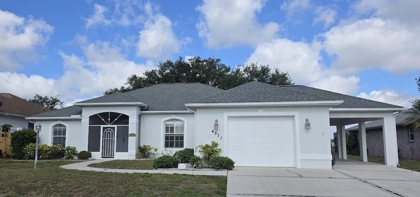 Welcome Home, this 3-bedroom 2 bath home is situated on an - Beach Home for sale in North Port, Florida on Beachhouse.com
