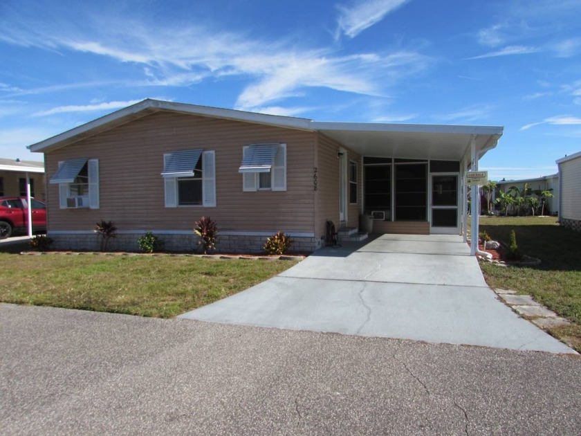 This home has beautiful, durable laminate flooring throughout - Beach Home for sale in Trinity, Florida on Beachhouse.com