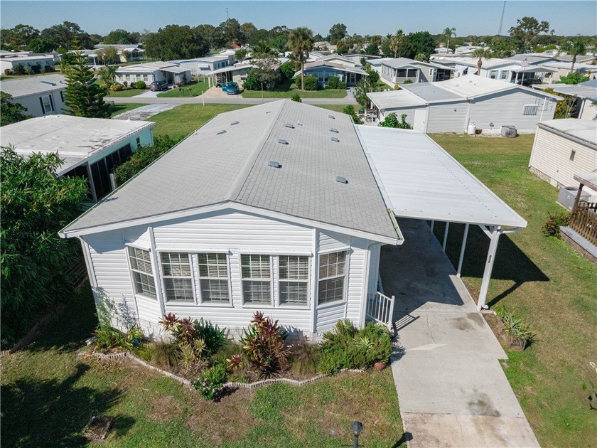 Built in 2021, this beautiful and spacious 2-bedroom, 2-bath - Beach Home for sale in Barefoot Bay, Florida on Beachhouse.com