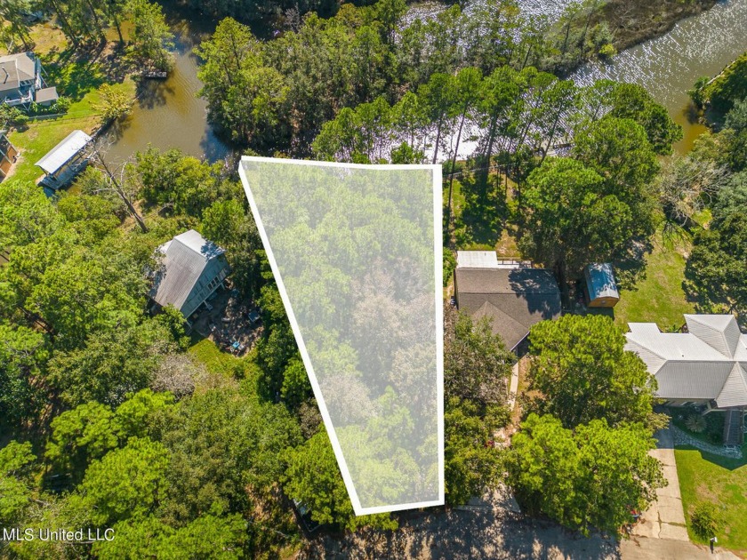 Seize the rare opportunity to own this stunning waterfront lot - Beach Lot for sale in Gautier, Mississippi on Beachhouse.com