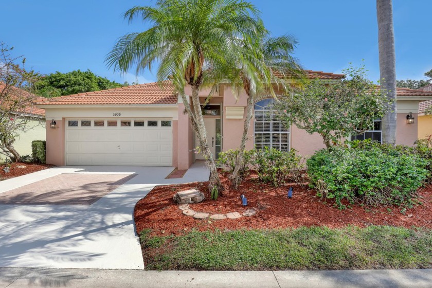 Discover resort-style living in this desirable guard-gated - Beach Home for sale in Riviera Beach, Florida on Beachhouse.com