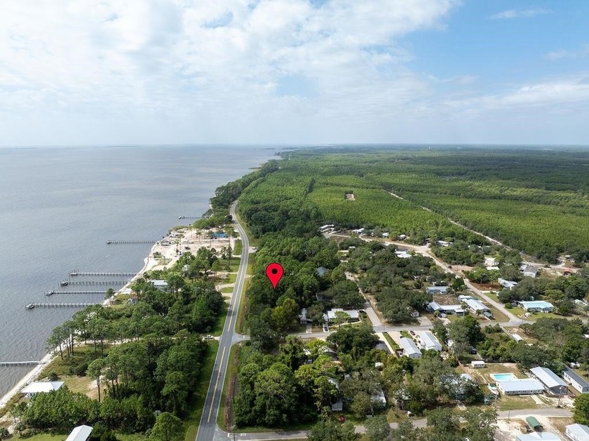 Stunning Bay View Lot! Seize the opportunity to own a - Beach Lot for sale in Lanark Village, Florida on Beachhouse.com