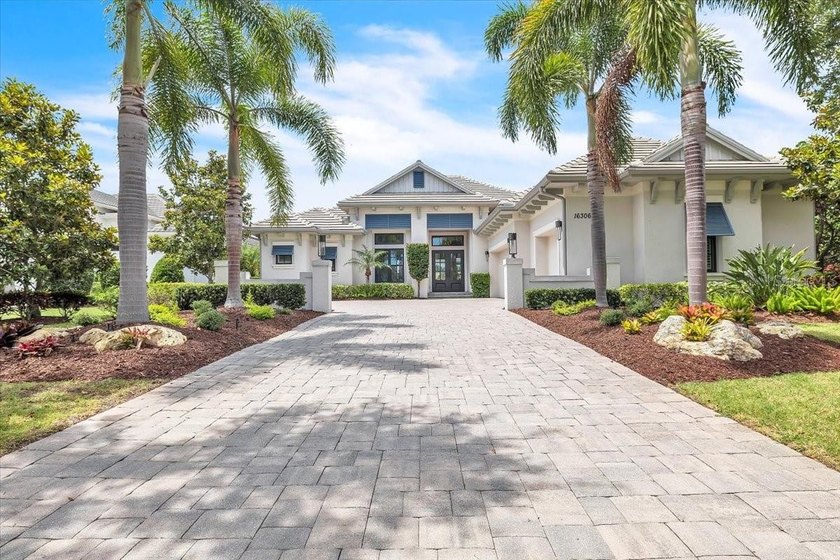 GORGEOUS. Welcome to luxury lakefront living in The Lake Club at - Beach Home for sale in Lakewood Ranch, Florida on Beachhouse.com